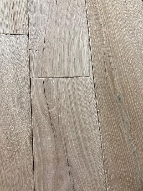 https://www.parquetversaillesancien.fr/wp-content/uploads/2023/07/Aged-and-Distressed-Wood-Flooring-planks-3.jpg