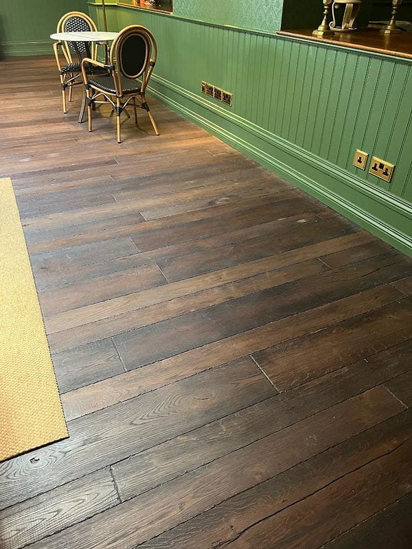 https://www.parquetversaillesancien.fr/wp-content/uploads/2023/07/Aged-and-Distressed-Wood-Flooring-planks-4.jpg