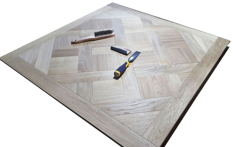 https://www.parquetversaillesancien.fr/wp-content/uploads/2023/07/Antiquing-parquet-panels.jpg