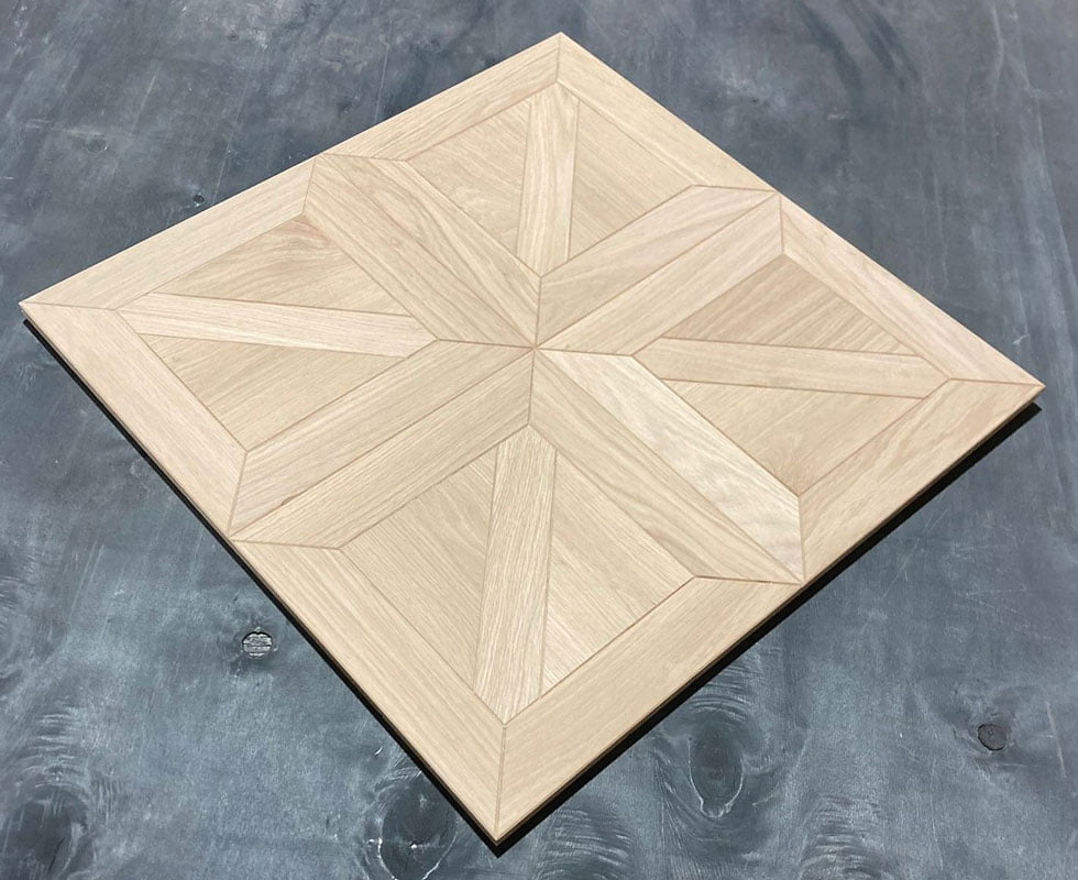 https://www.parquetversaillesancien.fr/wp-content/uploads/2023/07/Parquet-panels-flooring-5.jpg
