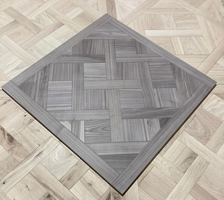 https://www.parquetversaillesancien.fr/wp-content/uploads/2023/07/VERSAILLES-PARQUET-PANELS-American-walnut-wood-1.jpg